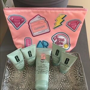 NWT Clinique 7 Day Scrub Cream one 3.4 oz & four travel size 1 oz tubes & bag